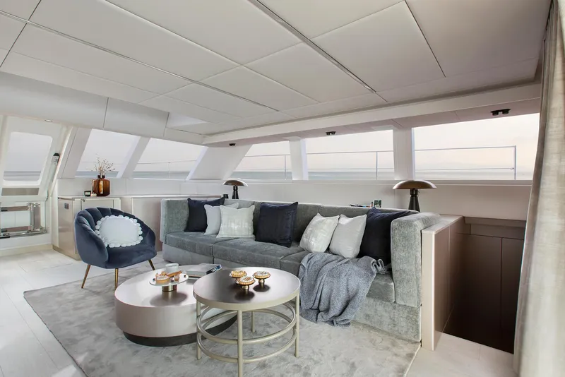 Slide: The Image of Luxurious interior of 2026 Sunreef 60 Sunreef Power yacht with modern seating and decor. - 7
