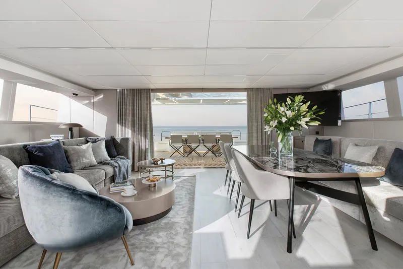 Slide: The Image of Luxurious interior of 2026 Sunreef 60 Power yacht with elegant seating and ocean view. - 9