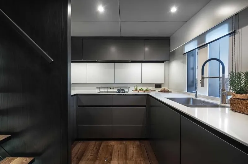 Slide: The Image of Modern kitchen interior on 2026 Sunreef 70 Sunreef Power yacht, featuring sleek cabinetry and fixtures. - 5