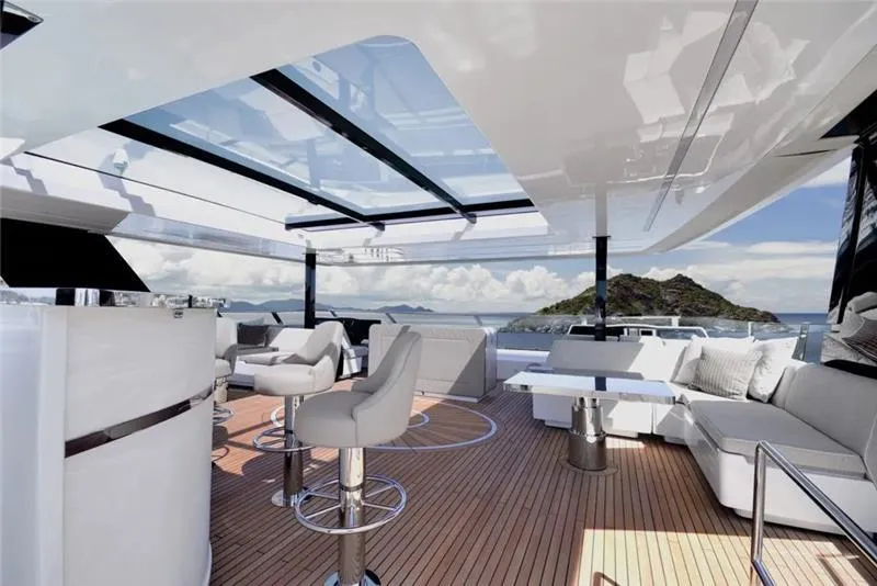 Slide: The Image of Luxurious 2026 Sunreef 80 Sunreef Power yacht with elegant outdoor seating and ocean view. - 14