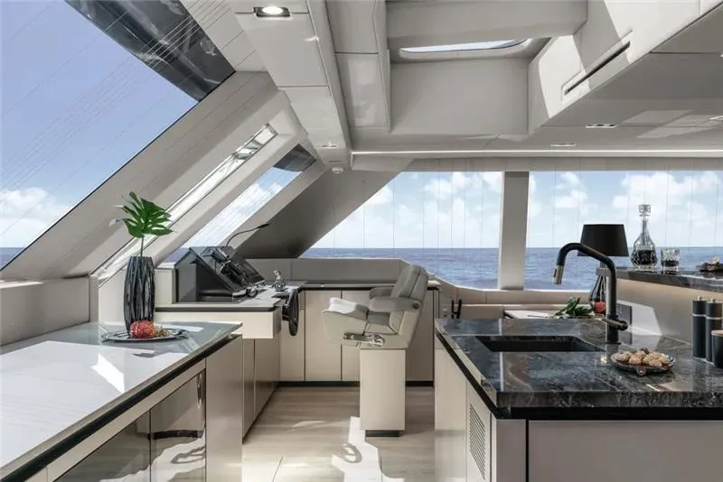 Slide: The Image of Luxurious interior of 2026 Sunreef 80 Sunreef Power yacht with modern kitchen and ocean view. - 19