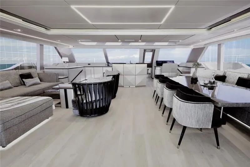Slide: The Image of Luxurious interior of 2026 Sunreef 80 Sunreef Power yacht with modern seating and dining area. - 26
