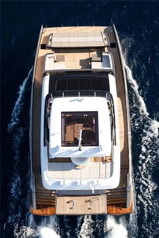 Slide: The Image of Aerial view of 2026 Sunreef 80 Sunreef Power yacht cruising on the ocean. - 4