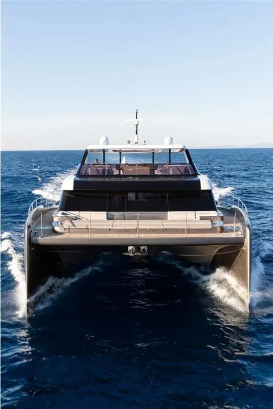 Slide: The Image of Luxury 2026 Sunreef 80 Power yacht cruising on open sea. - 6