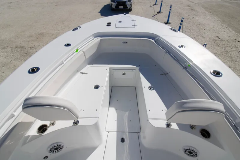 Slide: The Image of 2026 Sea Hunt Gamefish 25 boat interior with seating and storage compartments. - 3