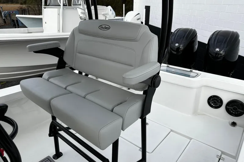 Slide: The Image of 2024 Pair Customs 24DV boat seat with gray upholstery and armrests. - 16