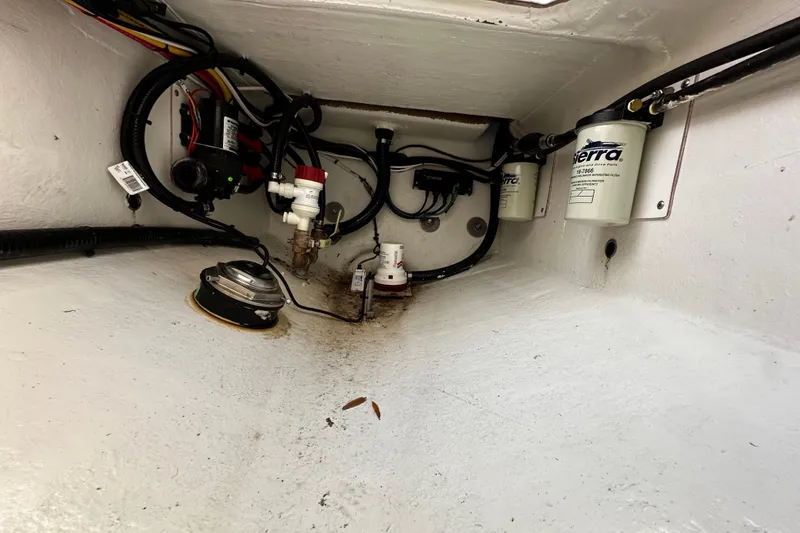 Slide: The Image of Engine compartment of 2024 Pair Customs 24DV with wiring and fuel filters. - 31