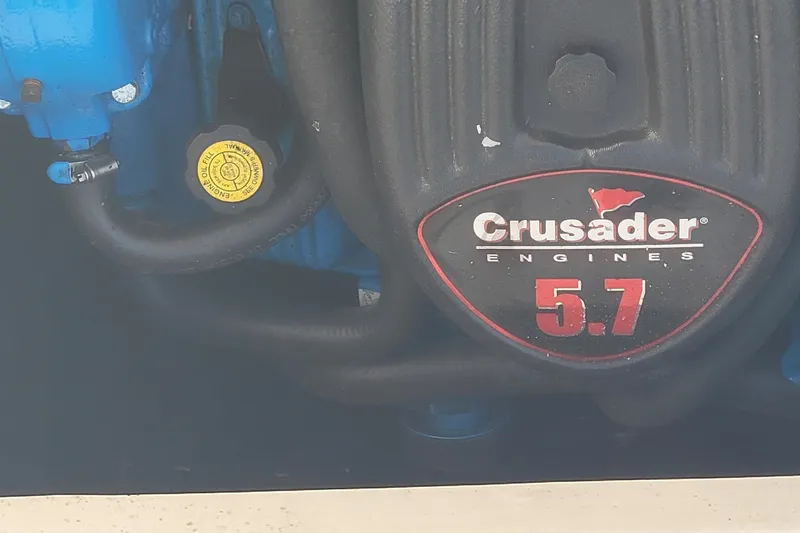 Slide: The Image of Crusader 5.7 engine in 1990 Phoenix 29 SFX Convertible boat. - 39