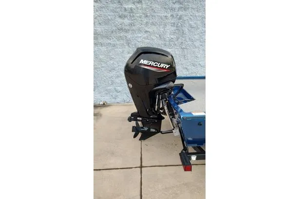 Slide: The Image of 2021 Lund 1775 Renegade boat with Mercury outboard motor on a trailer. - 10