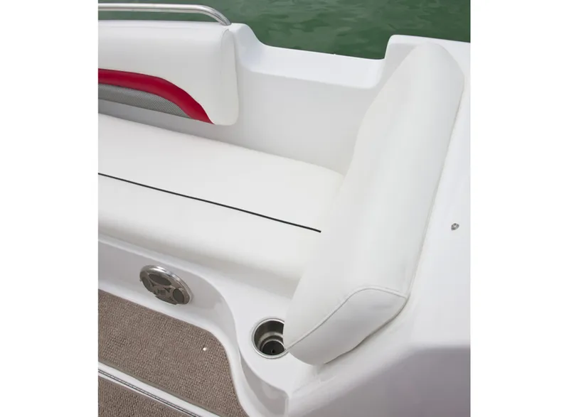 Slide: The Image of 2013 Hurricane Sundeck 217 IO boat on red trailer, parked outdoors. - 3