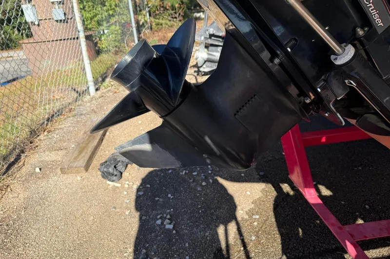 Slide: The Image of Close-up of a 2013 Hurricane Sundeck 217 IO boat propeller on a sunny day. - 8