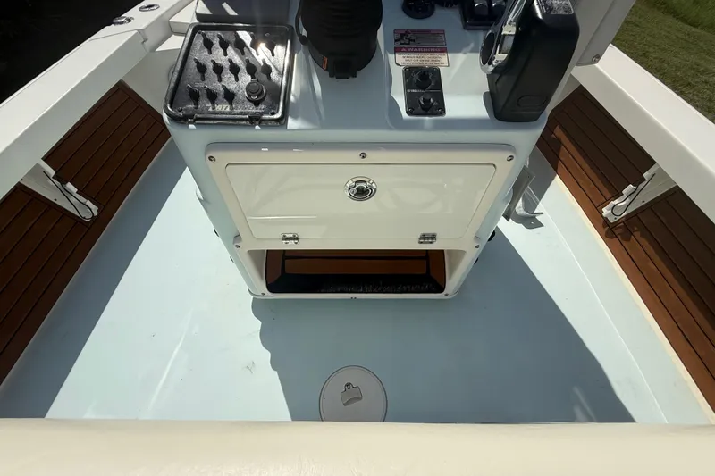 Slide: The Image of 2016 Pathfinder 2300 HPS boat console with storage and control panel. - 26