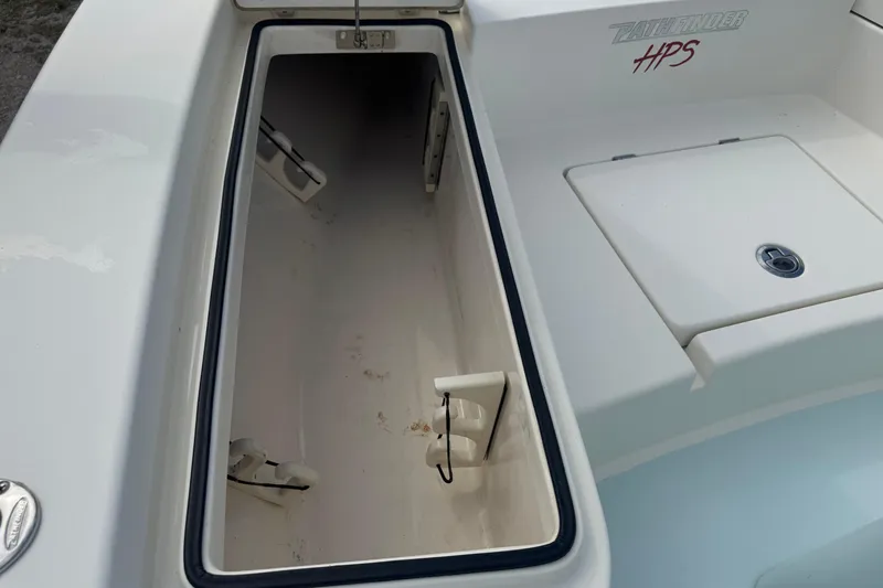 Slide: The Image of 2016 Pathfinder 2300 HPS boat storage compartment with open hatch. - 32