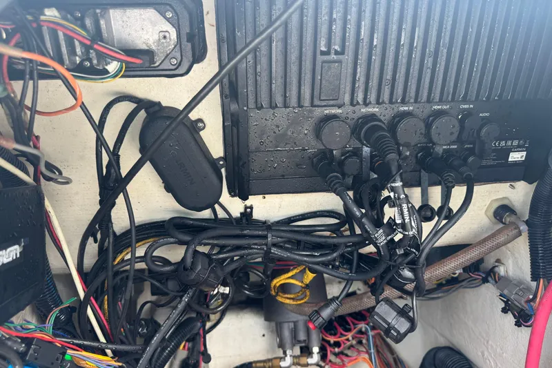 Slide: The Image of 2016 Pathfinder 2300 HPS boat wiring and electronics setup with Garmin components. - 40