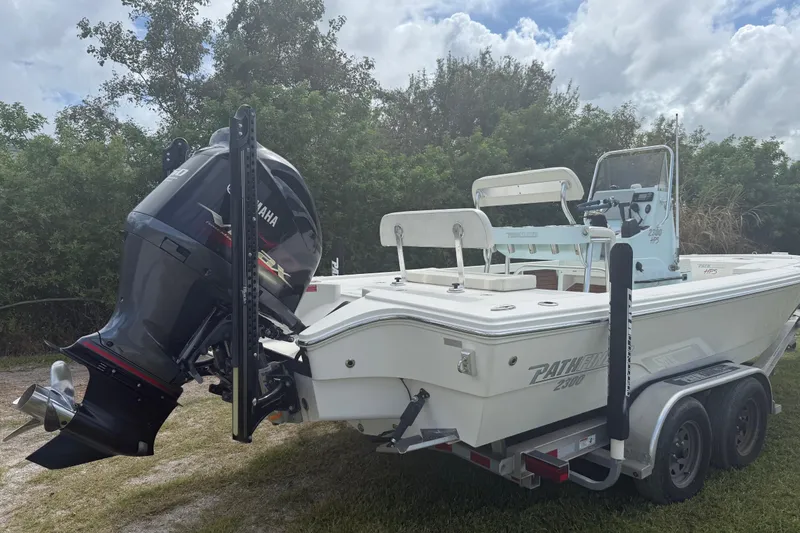 Slide: The Image of 2016 Pathfinder 2300 HPS boat on trailer with Yamaha outboard motor. - 6