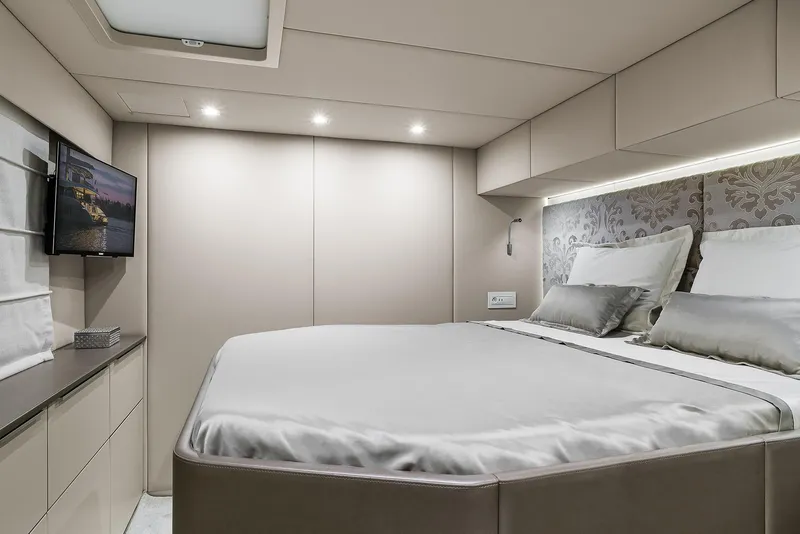 Slide: The Image of Luxurious bedroom interior of 2026 Sunreef 50 yacht with modern design and ambient lighting. - 12