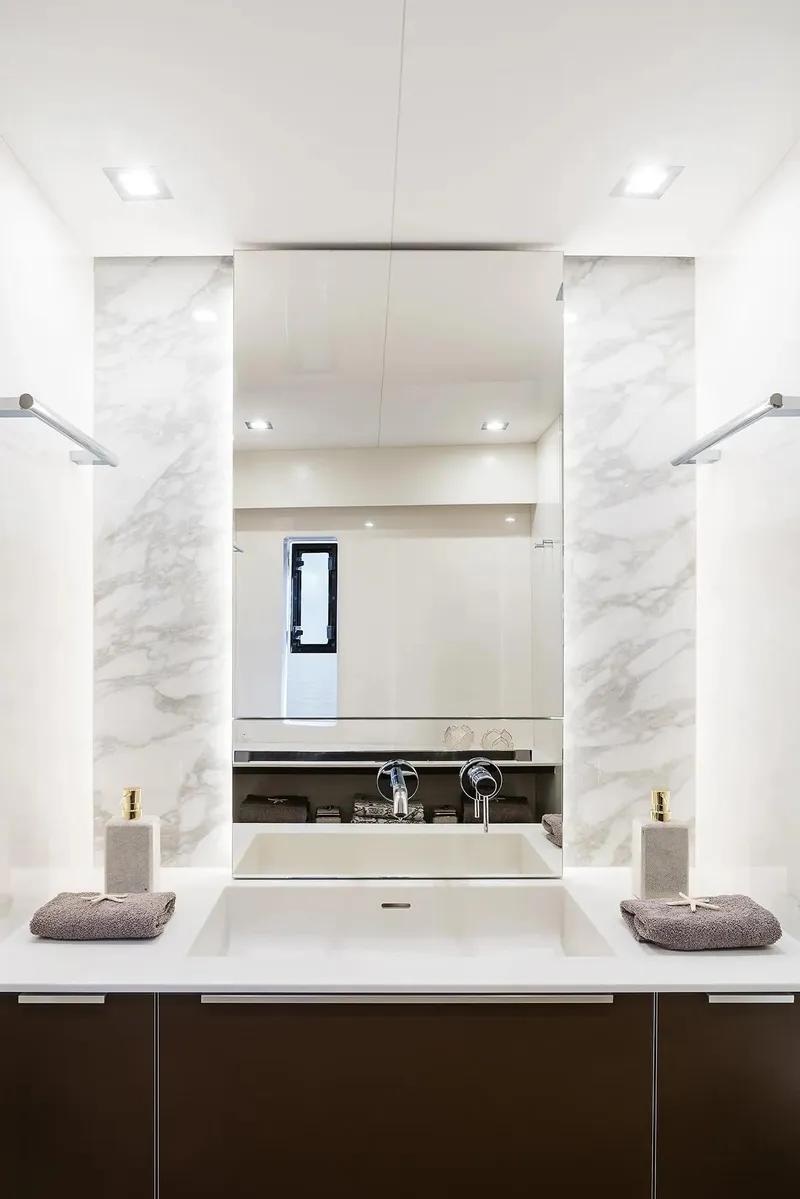 Slide: The Image of Luxurious bathroom interior of 2026 Sunreef 50 yacht with modern fixtures and elegant design. - 14