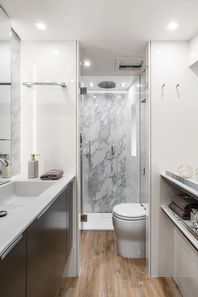 Slide: The Image of Luxurious bathroom in 2026 Sunreef 50 yacht with modern fixtures and marble accents. - 15