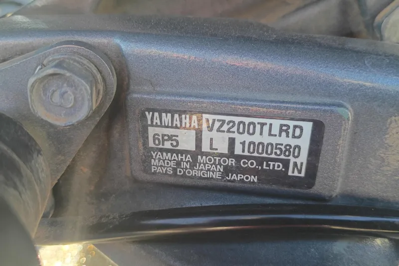 Slide: The Image of Yamaha VZ200TLRD engine label on 2005 Ranger 519SVX Comanche, made in Japan. - 10