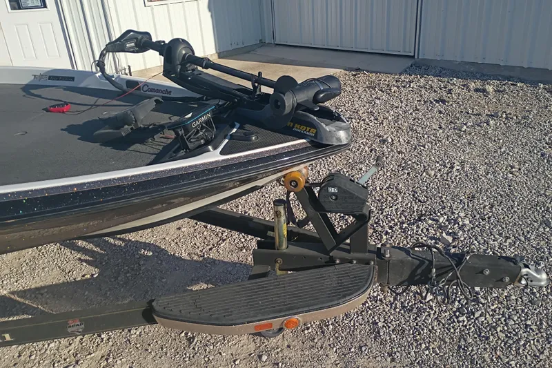 Slide: The Image of 2005 Ranger 519SVX Comanche boat on trailer, featuring Garmin equipment and Minn Kota trolling motor. - 11