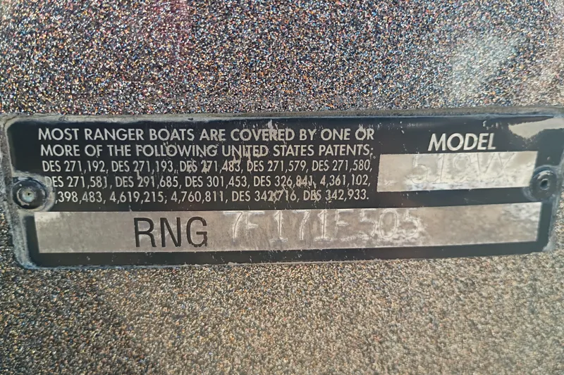 Slide: The Image of 2005 Ranger 519SVX Comanche boat model plate with patent details and serial number. - 8