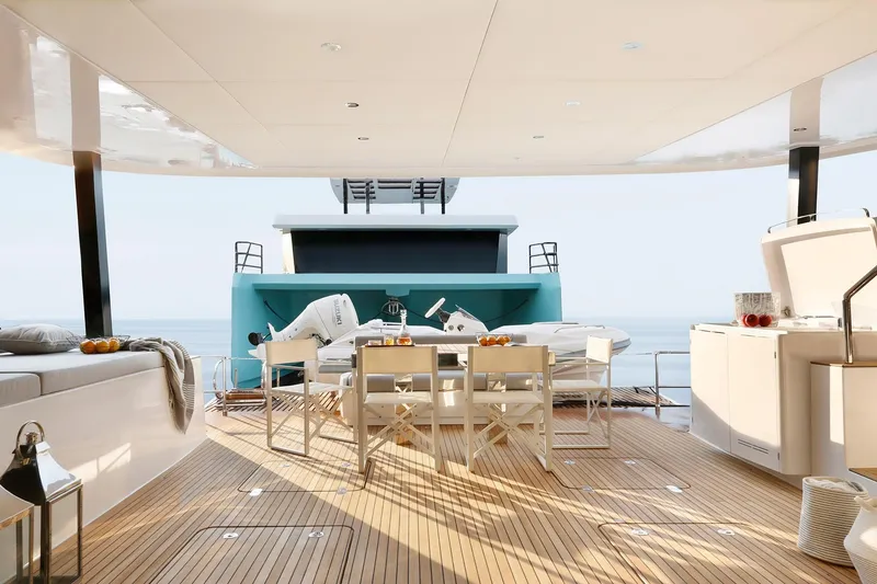 Slide: The Image of Luxurious Sunreef 60 yacht deck with elegant seating, ocean view, and modern amenities, 2026 model. - 5