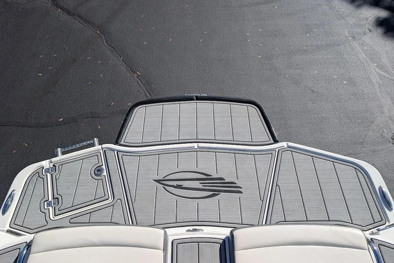Slide: The Image of 2018 Chaparral Vortex 223 VRX boat deck with sleek design and logo. - 26