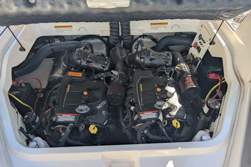 Slide: The Image of Engine compartment of 2018 Chaparral Vortex 223 VRX boat, showcasing dual Rotax engines. - 31