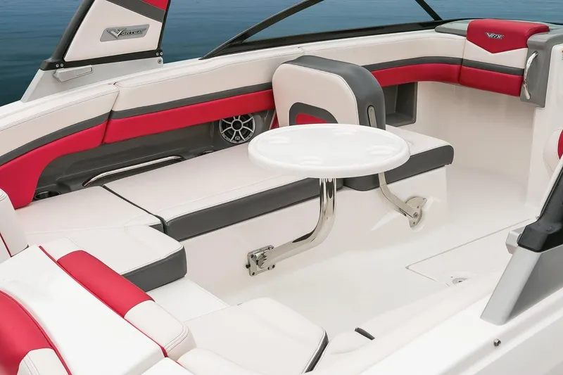 Slide: The Image of Manufacturer Provided Image: 2018 Chaparral Vortex 223 VRX boat interior with red and white seating and a small table. - 34