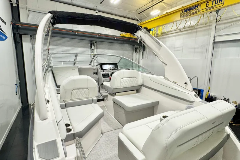 Slide: The Image of 2026 Regal 26 XO boat interior with luxurious white seating and modern design. - 5