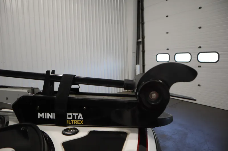 Slide: The Image of Minn Kota Ultrex motor on 2014 Nitro Z-7 boat in garage setting. - 13