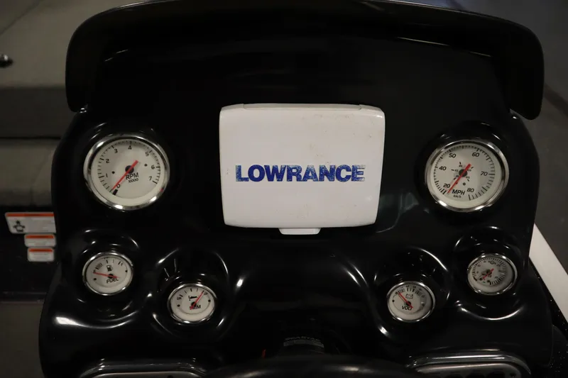 Slide: The Image of Dashboard of a 2014 Nitro Z-7 boat featuring Lowrance display and gauges. - 27