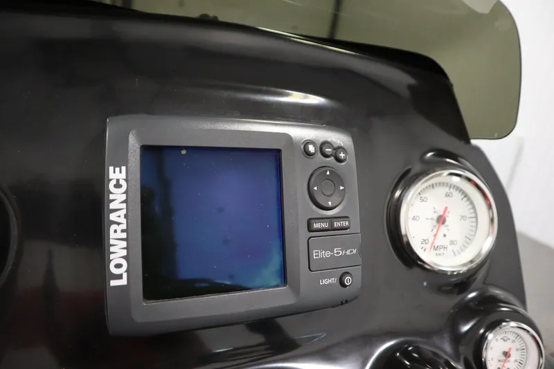 Slide: The Image of Lowrance Elite-5 HDI fishfinder on 2014 Nitro Z-7 boat dashboard with speedometer. - 28