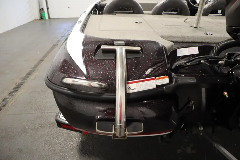 Slide: The Image of 2014 Nitro Z-7 boat rear view with metallic finish and safety labels. - 40