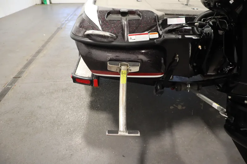 Slide: The Image of Rear view of a 2014 Nitro Z-7 boat on a trailer in a garage. - 41