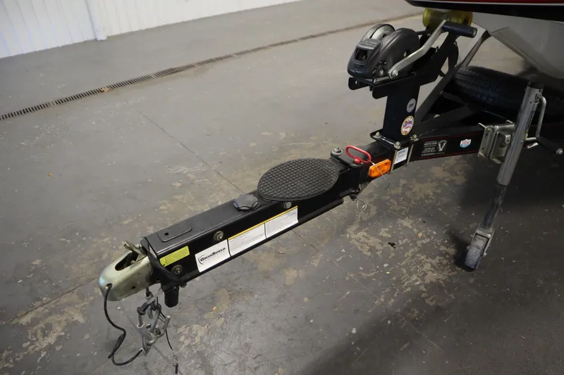 Slide: The Image of Trailer hitch of a 2014 Nitro Z-7 boat on a concrete floor. - 46