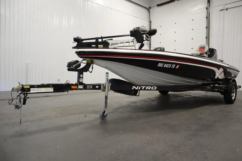 Slide: The Image of 2014 Nitro Z-7 boat on trailer in indoor storage facility. - 48