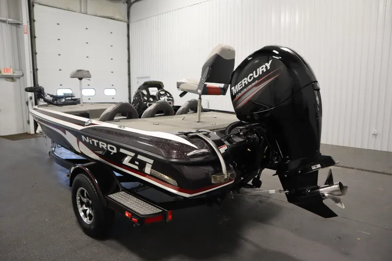 Slide: The Image of 2014 Nitro Z-7 boat with Mercury engine in indoor storage. - 7