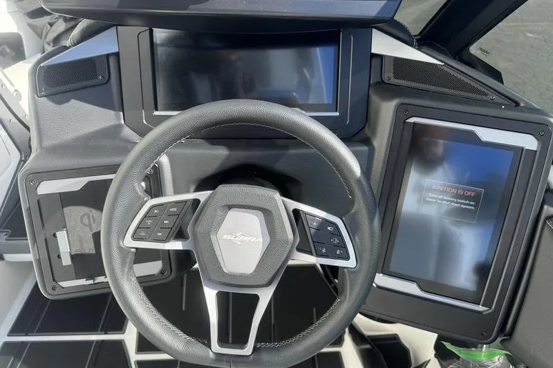 Slide: The Image of 2025 Supra SL 575 dashboard with steering wheel and digital displays. - 5