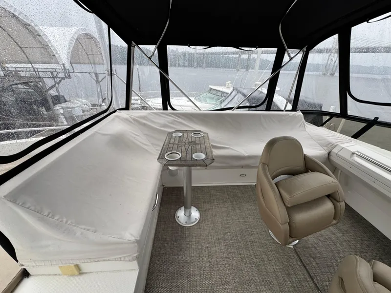 Slide: The Image of Interior of 2014 Carver C40 Command Bridge with seating and table. - 21