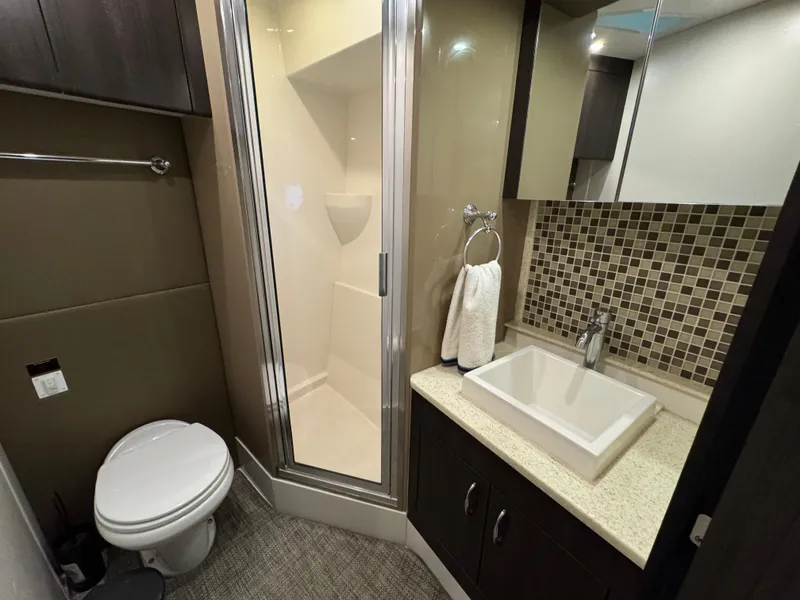 Slide: The Image of Bathroom interior of 2014 Carver C40 Command Bridge with shower, sink, and toilet. - 49