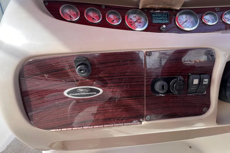 Slide: The Image of Dashboard of 2002 Chaparral 232 Sunesta boat with gauges and controls. - 21
