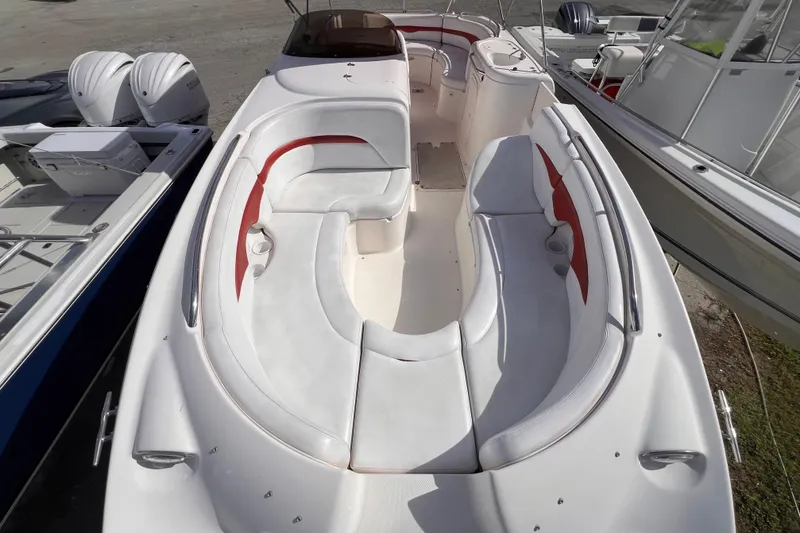 Slide: The Image of 2002 Chaparral 232 Sunesta boat with spacious seating and sleek design. - 29
