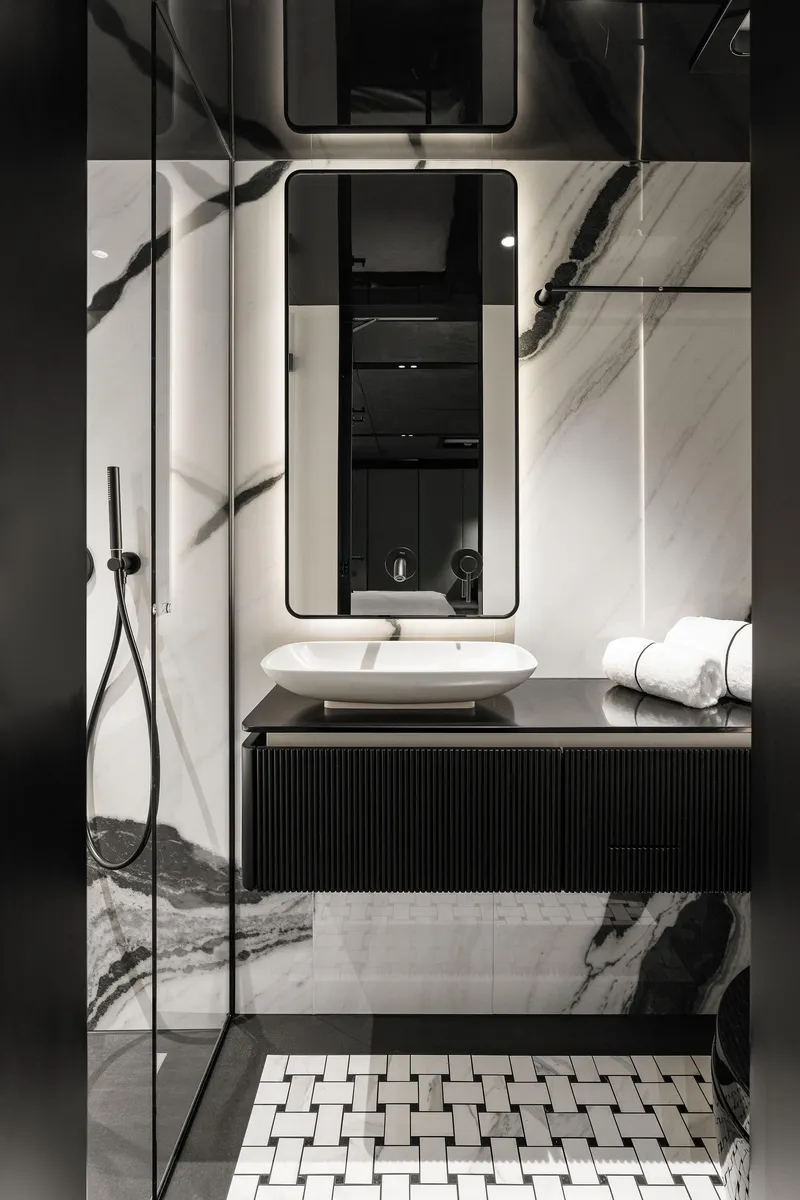Slide: The Image of Luxurious bathroom in 2026 Sunreef 70 yacht with modern design and elegant marble accents. - 10