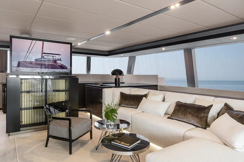 Slide: The Image of Luxurious interior of 2026 Sunreef 70 yacht with modern furnishings and ocean view. - 14