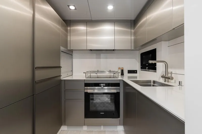 Slide: The Image of Modern kitchen in 2026 Sunreef 70 yacht with sleek stainless steel design. - 20