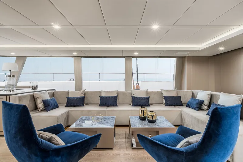 Slide: The Image of Luxurious interior of 2026 Sunreef 80 yacht with elegant seating and modern decor. - 16