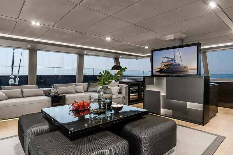 Slide: The Image of Luxurious interior of 2026 Sunreef 80 yacht with modern decor and large TV screen. - 19