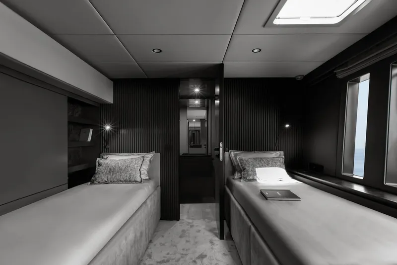 Slide: The Image of Luxurious twin cabin interior of 2026 Sunreef 80 yacht, featuring modern design and ambient lighting. - 22