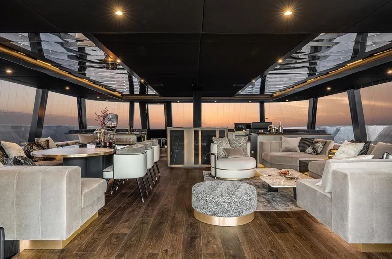 Slide: The Image of Luxurious interior of 2026 Sunreef 80 yacht with elegant seating and panoramic views. - 8